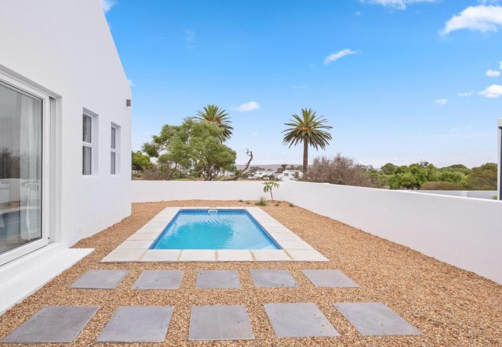 Sunlit Oasis Ocean and Golf Retreat