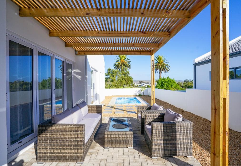 Sunlit Oasis Ocean and Golf Retreat