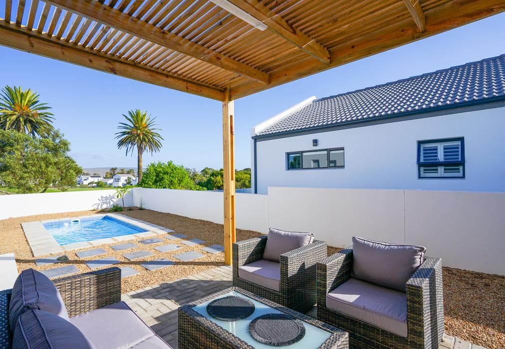 Sunlit Oasis Ocean and Golf Retreat