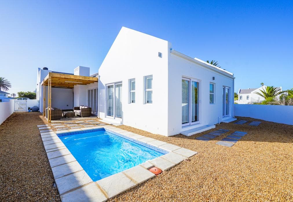 Sunlit Oasis Ocean and Golf Retreat