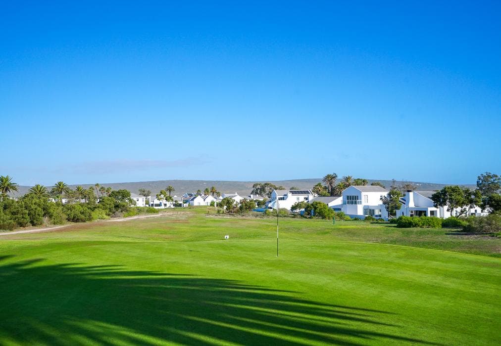 Sunlit Oasis Ocean and Golf Retreat