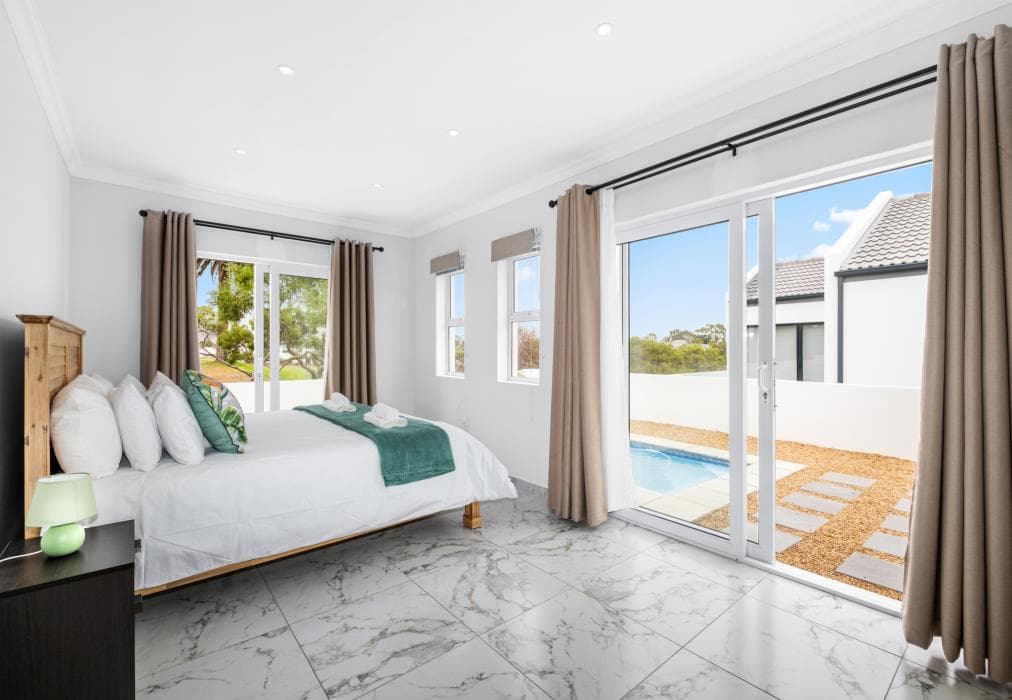 Sunlit Oasis Ocean and Golf Retreat